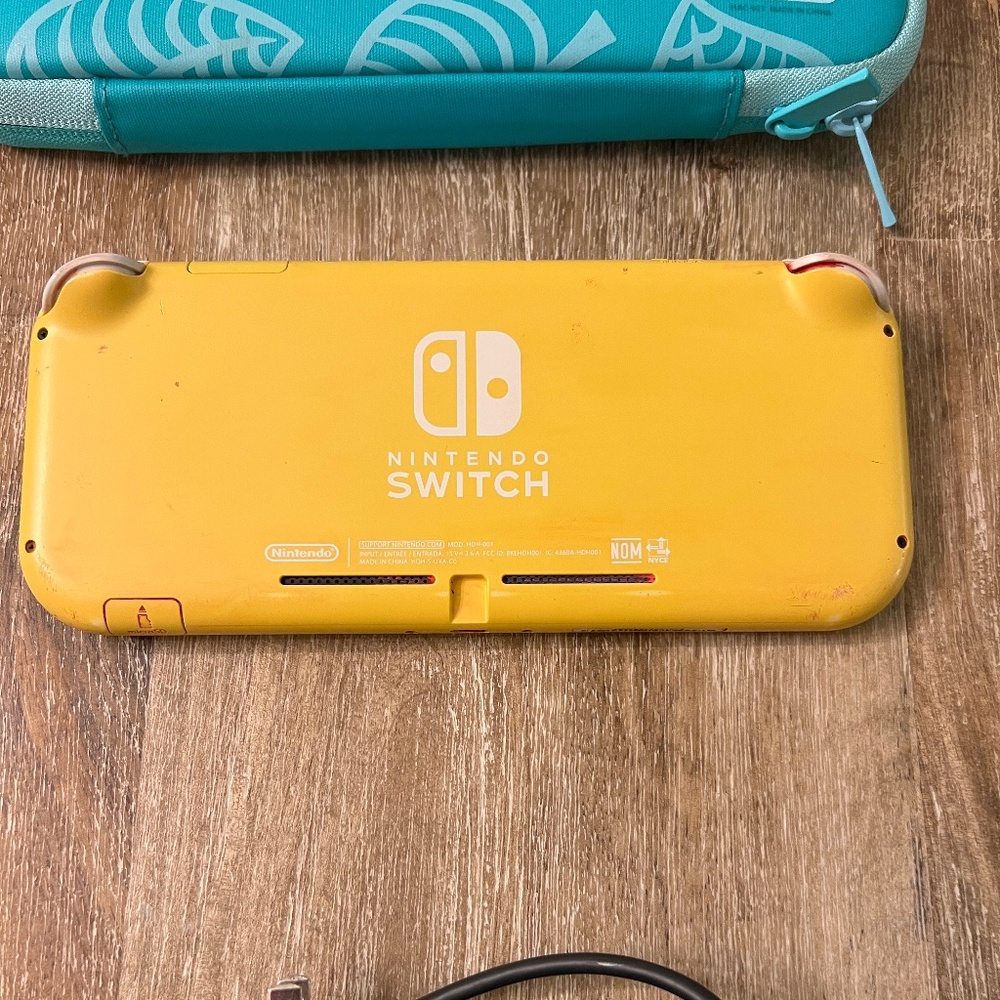 Nintendo Switch Lite – Yellow with Case - Picture 2 of 3